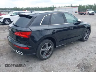 2018 Audi SQ5 Premium Plus z VIN WA1A4AFY6J2009085, wystawiony jako IAAI lot #42410933 z przebiegiem 59 773 mil mil oraz . Historia ofert i sprzedaży dostępna na DreamBid. Obrazek 4.