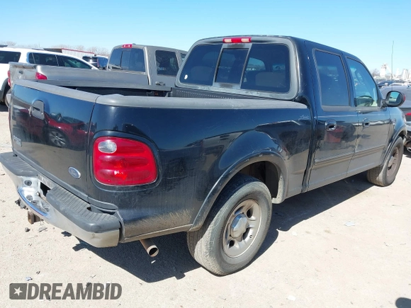 2003 Ford F-150 XLT with VIN 1FTRW07L83KC62296, listed as a IAAI auction lot 41689891 with 272,210 mi miles. Bid and sale history available at carsss.com. Image 4.