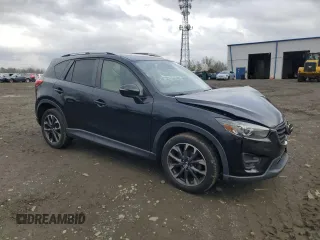 2016 Mazda CX-5 Grand Touring with VIN JM3KE4DY0G0727366, listed as a Copart auction lot 51682115 with 114,462 mi miles and Salvage Title. Bid and sale history available at carsss.com. Image 4.