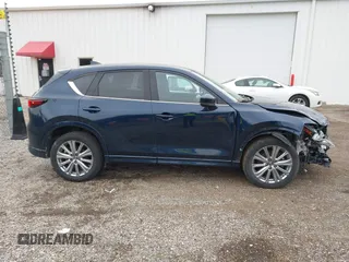 2023 Mazda CX-5 Signature with VIN JM3KFBXY5P0251046, listed as a IAAI auction lot 41505815 with 37,594 mi miles and . Bid and sale history available at carsss.com. Image 13.