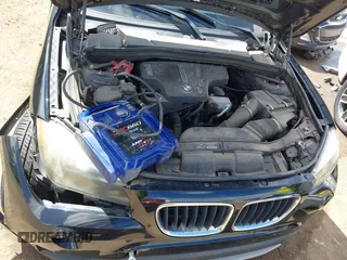2013 BMW X1 28i z VIN WBAVM1C52DVW41549, wystawiony jako IAAI lot #42207042 z przebiegiem 74 689 mil mil oraz . Historia ofert i sprzedaży dostępna na DreamBid. Obrazek 10.