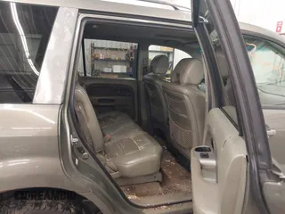 2007 Honda Pilot EX-L z VIN 2HKYF185X7H505077, wystawiony jako IAAI lot #42362215 z przebiegiem 174 592 mil mil oraz . Historia ofert i sprzedaży dostępna na DreamBid. Obrazek 8.