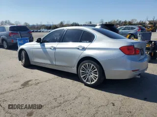 2014 BMW 3 Series 335i xDrive with VIN WBA3B9G57ENR91797, listed as a Copart auction lot 53724325 with 164,279 mi miles and Salvage Title. Bid and sale history available at DreamBid. Image 2.