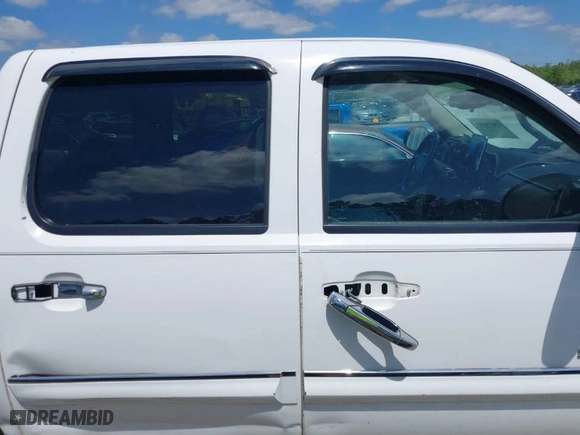 2012 GMC Sierra 1500 SLE with VIN 3GTP2VE73CG121892, listed as a IAAI auction lot 42028459 with 202,598 mi miles. Bid and sale history available at carsss.com. Image 13.