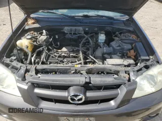 2006 Mazda Tribute i with VIN 4F2YZ92Z76KM26192, listed as a Copart auction lot 50412865 with 152,851 mi miles and Salvage Title. Bid and sale history available at carsss.com. Image 13.