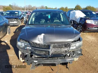 2016 Dodge Journey Crossroad with VIN 3C4PDCGG7GT138932, listed as a IAAI auction lot 41311882 with 131,734 mi miles and . Bid and sale history available at DreamBid. Image 13.