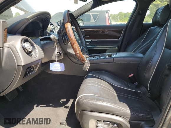 2014 Jaguar XJ Portfolio with VIN SAJWA2GZ2E8V66906, listed as a Copart auction lot 64888135 with 166,194 mi miles and Clean title. Bid and sale history available at DreamBid. Image 7.