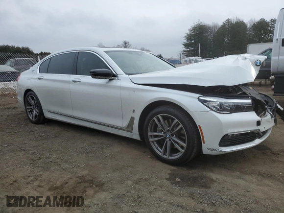 2018 BMW 7 Series 740e xDrive with VIN WBA7J2C57JG938114, listed as a Copart auction lot 41833424 with 45,559 mi miles and . Bid and sale history available at DreamBid. Image 4.