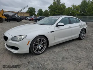 2015 BMW 6 Series 650i with VIN WBA6B2C57FGB99135, listed as a Copart auction lot 72610904 with 99,137 mi miles and Salvage Title. Bid and sale history available at carsss.com. Image 1.