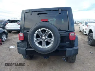 2016 Jeep Wrangler Unlimited 75th Anniversary with VIN 1C4BJWEG1GL221873, listed as a IAAI auction lot 41635788 with 148,493 mi miles. Bid and sale history available at carsss.com. Image 17.
