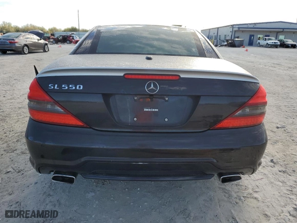 2009 Mercedes-Benz SL-Class V8 with VIN WDBSK71F09F144591, listed as a Copart auction lot 46873785 with 63,977 mi miles and Salvage Title. Bid and sale history available at carsss.com. Image 6.