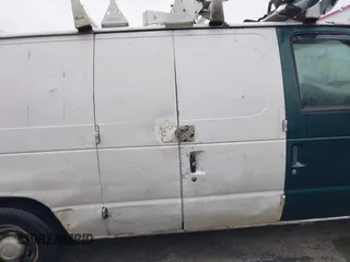 2004 Ford Econoline Cargo with VIN 1FTRE14W44HB53758, listed as a IAAI auction lot 40926124 with 139,104 mi miles. Bid and sale history available at carsss.com. Image 12.