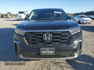2025 Honda Pilot EX-L with VIN 5FNYG2H48SB006313, listed as a Copart auction lot 82039054 with 10,402 mi miles and Salvage Title. Bid and sale history available at carsss.com. Image 5.