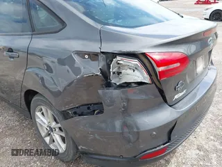 2016 Ford Focus SE with VIN 1FADP3F20GL202777, listed as a IAAI auction lot 42077501 with 116,351 mi miles and . Bid and sale history available at DreamBid. Image 6.