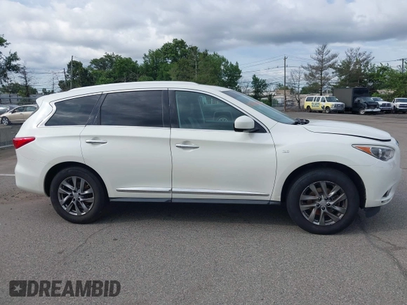 2015 Infiniti QX60 with VIN 5N1AL0MM3FC540132, listed as a IAAI auction lot 42760442 with 197,075 mi miles and . Bid and sale history available at DreamBid. Image 13.