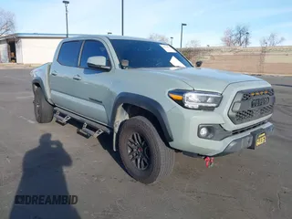 2023 Toyota Tacoma 4WD SR with VIN 3TMCZ5AN4PM574215, listed as a IAAI auction lot 41684524 with 55,855 mi miles. Bid and sale history available at carsss.com. Image 1.