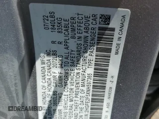 2022 Honda Civic Sport z VIN 2HGFE2F5XNH597365, wystawiony jako Copart lot #55620735 z przebiegiem 28 526 mil mil oraz Szkoda całkowita • Salvage title. Historia ofert i sprzedaży dostępna na DreamBid. Obrazek 13.
