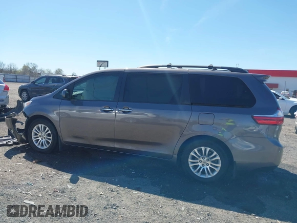 2015 Toyota Sienna XLE with VIN 5TDYK3DC4FS634937, listed as a IAAI auction lot 41869781 with 65,561 mi miles and . Bid and sale history available at carsss.com. Image 14.