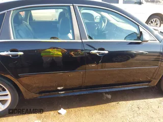 2012 Chevrolet Impala LTZ with VIN 2G1WC5E39C1280827, listed as a IAAI auction lot 41979470 with 153,669 mi miles and . Bid and sale history available at DreamBid. Image 13.