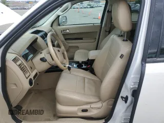 2010 Ford Escape Limited with VIN 1FMCU0E74AKC89196, listed as a Copart auction lot 50990585 with 144,830 mi miles and Salvage title. Bid and sale history available at DreamBid. Image 7.