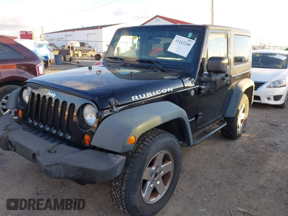 2011 Jeep Wrangler Rubicon with VIN 1J4HA6D11BL564211, listed as a IAAI auction lot 41242240 with 124,039 mi miles and . Bid and sale history available at carsss.com. Image 18.