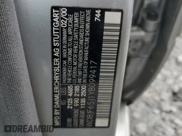 2000 Mercedes-Benz E 320 with VIN WDBJF65J1YB099417, listed as a Copart auction lot 54656915 with 130,387 mi miles and Salvage Title. Bid and sale history available at DreamBid. Image 12.