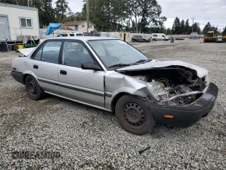 1991 Toyota Corolla z VIN 1NXAE94A8MZ234510, wystawiony jako Copart lot #75002404 z przebiegiem 188 051 mil mil oraz Szkoda całkowita • Salvage title. Historia ofert i sprzedaży dostępna na DreamBid. Obrazek 4.