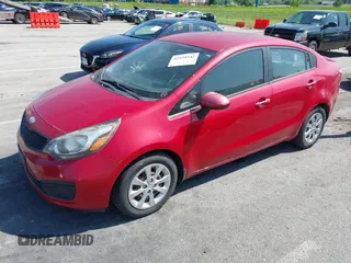 2014 Kia Rio LX with VIN KNADM4A32E6334330, listed as a IAAI auction lot 42239542 with 134,314 mi miles and . Bid and sale history available at DreamBid. Image 2.