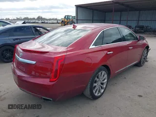 2013 Cadillac XTS Luxury with VIN 2G61P5S32D9143521, listed as a IAAI auction lot 41167887 with 193,347 mi miles and . Bid and sale history available at carsss.com. Image 4.