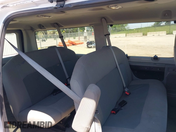 2013 Ford Econoline Passenger XL with VIN 1FMNE1BLXDDB29636, listed as a IAAI auction lot 42274116 with 141,261 mi miles and . Bid and sale history available at DreamBid. Image 8.