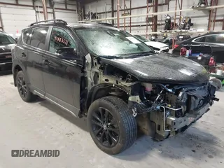 2018 Toyota RAV4 XLE with VIN 2T3RFREV0JW715761, listed as a IAAI auction lot 41881863 with 67,534 mi miles and . Bid and sale history available at carsss.com. Image 1.