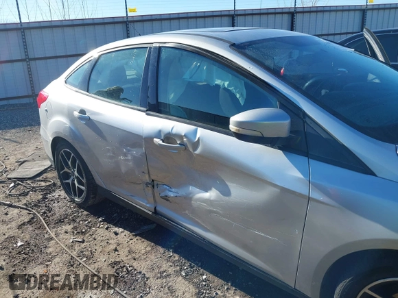 2017 Ford Focus SEL with VIN 1FADP3H24HL327179, listed as a IAAI auction lot 41607974 with 86,306 mi miles. Bid and sale history available at carsss.com. Image 6.