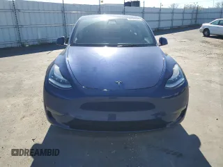 2021 Tesla Model Y Long Range z VIN 5YJYGDEE6MF089493, wystawiony jako Copart lot #48349575 z przebiegiem 52 245 mil mil oraz Szkoda całkowita • Salvage title. Historia ofert i sprzedaży dostępna na DreamBid. Obrazek 5.