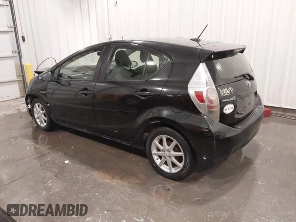 2012 Toyota Prius c One with VIN JTDKDTB35C1009930, listed as a IAAI auction lot 41961471 with 174,252 mi miles. Bid and sale history available at carsss.com. Image 3.