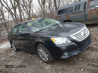 2010 Toyota Avalon XL with VIN 4T1BK3DB7AU359643, listed as a IAAI auction lot 41561066 with 171,526 mi miles and . Bid and sale history available at carsss.com. Image 1.