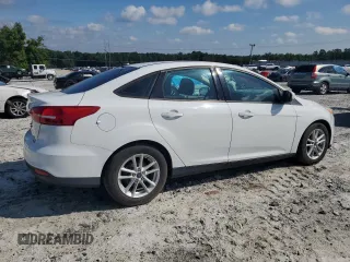 2015 Ford Focus SE with VIN 1FADP3F22FL218056, listed as a Copart auction lot 63093805 with 145,824 mi miles and Clean title. Bid and sale history available at DreamBid. Image 3.
