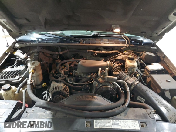 2000 Chevrolet Blazer LS z VIN 1GNCT18W9YK188091, wystawiony jako Copart lot #78592844 z przebiegiem 69 497 mil mil oraz Szkoda całkowita • Salvage title. Historia ofert i sprzedaży dostępna na DreamBid. Obrazek 12.