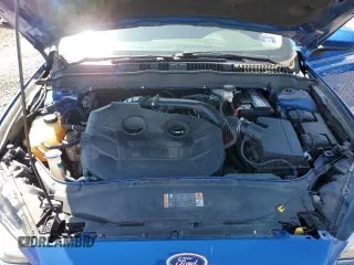 2017 Ford Fusion SE z VIN 3FA6P0T9XHR303675, wystawiony jako Copart lot #57134985 z przebiegiem 130 964 mil mil oraz Tytuł czysty. Historia ofert i sprzedaży dostępna na DreamBid. Obrazek 11.