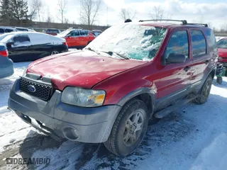 2005 Ford Escape XLT with VIN 1FMYU931X5KD99667, listed as a IAAI auction lot 41591057 with 69,595 mi miles. Bid and sale history available at carsss.com. Image 2.
