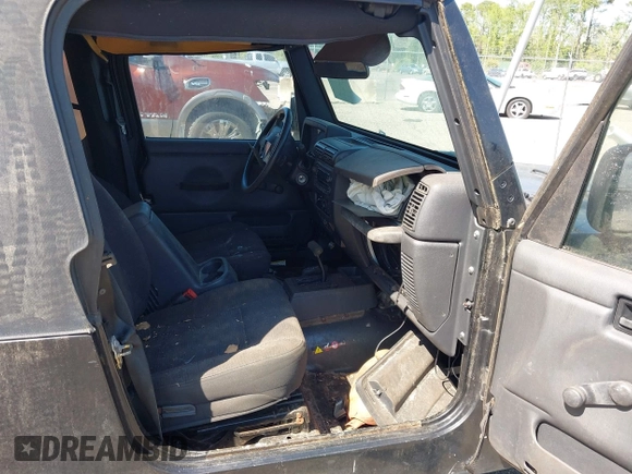 2005 Jeep Wrangler Unlimited with VIN 1J4FA44S25P385421, listed as a IAAI auction lot 42039381 with 1 mi miles. Bid and sale history available at carsss.com. Image 5.