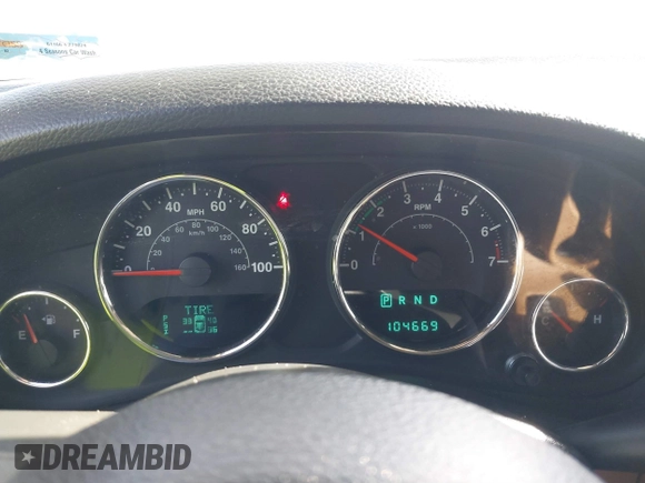 2014 Jeep Wrangler Unlimited Rubicon with VIN 1C4BJWFG1EL167423, listed as a IAAI auction lot 41861109 with 104,669 mi miles. Bid and sale history available at carsss.com. Image 7.