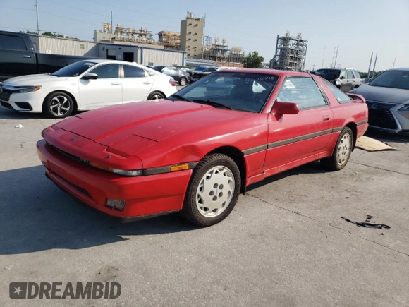 1988 Toyota Supra z VIN JT2MA71JXJ0094266, wystawiony jako Copart lot #59028715 z przebiegiem 133 654 mil mil oraz Czysty tytuł • Clean title. Historia ofert i sprzedaży dostępna na DreamBid. Obrazek 1.