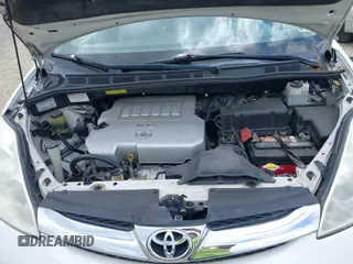 2007 Toyota Sienna XLE with VIN 5TDZK22C57S074123, listed as a IAAI auction lot 42128064 with 184,183 mi miles and . Bid and sale history available at DreamBid. Image 10.