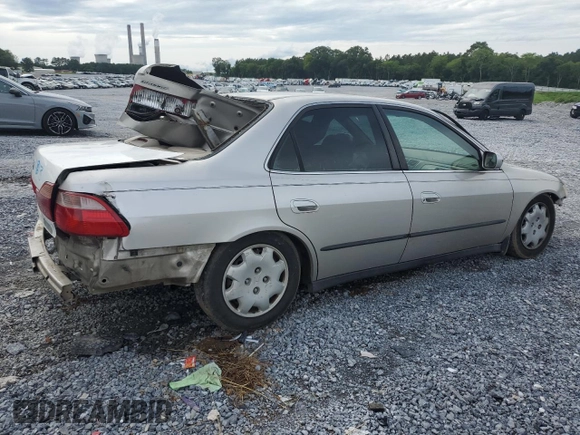 1998 Honda Accord LX with VIN 1HGCG5548WA156745, listed as a Copart auction lot 61944775 with 357,402 mi miles and Salvage title. Bid and sale history available at DreamBid. Image 3.