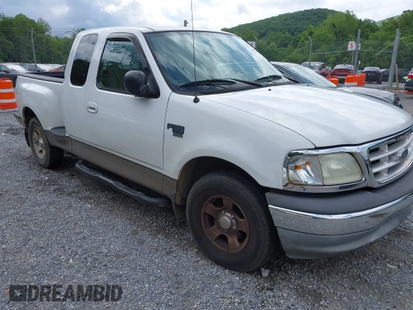 2003 Ford F-150 XL with VIN 1FTRX07WX3KD86058, listed as a IAAI auction lot 42502946 with Not provided miles and . Bid and sale history available at DreamBid. Image 1.