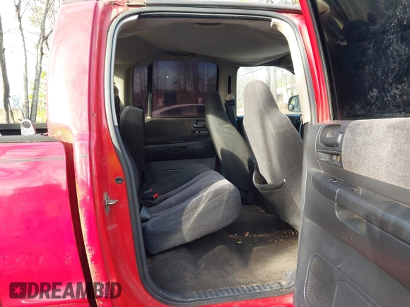 2004 Dodge Dakota Sport with VIN 1D7HG38N64S677103, listed as a IAAI auction lot 41665245 with 212,470 mi miles and . Bid and sale history available at carsss.com. Image 8.