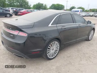 2017 Lincoln MKZ Reserve z VIN 3LN6L5EC4HR619712, wystawiony jako IAAI lot #41899418 z przebiegiem 77 481 mil mil oraz . Historia ofert i sprzedaży dostępna na DreamBid. Obrazek 4.