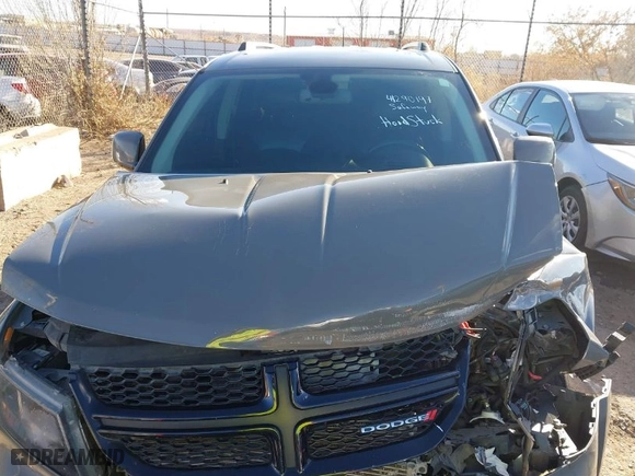 2019 Dodge Journey Crossroad with VIN 3C4PDCGG9KT857575, listed as a IAAI auction lot 41290197 with 91,051 mi miles. Bid and sale history available at carsss.com. Image 10.