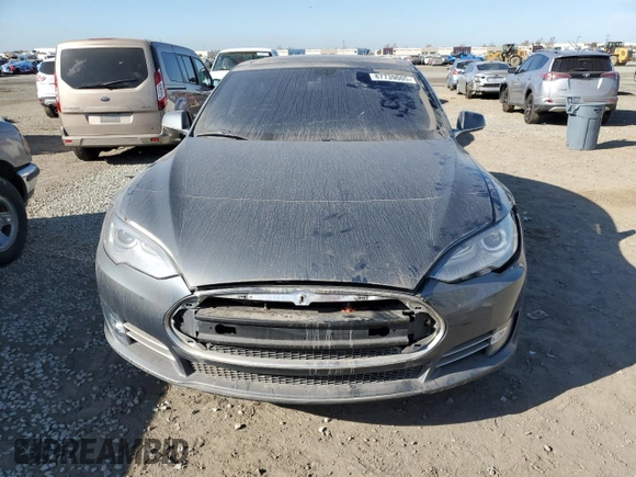 2013 Tesla Model S with VIN 5YJSA1CG9DFP09733, listed as a Copart auction lot 87739005 with 88,163 mi miles and Salvage title. Bid and sale history available at DreamBid. Image 5.