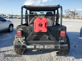 1997 Jeep Wrangler Sport with VIN 1J4FY19S0VP453959, listed as a Copart auction lot 44560295 with 182,464 mi miles and Salvage Title. Bid and sale history available at carsss.com. Image 6.